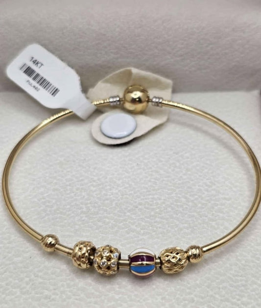 Rigid bracelet with charms